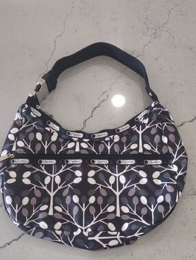LeSportsac Black/White/Charcoal Leaf Patterned Sling Hobo Bag NWOT